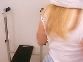 Sporty MILF exposes her massive jugs