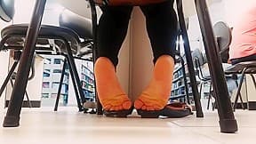 Candid Hispanic student 18+ shoeplay